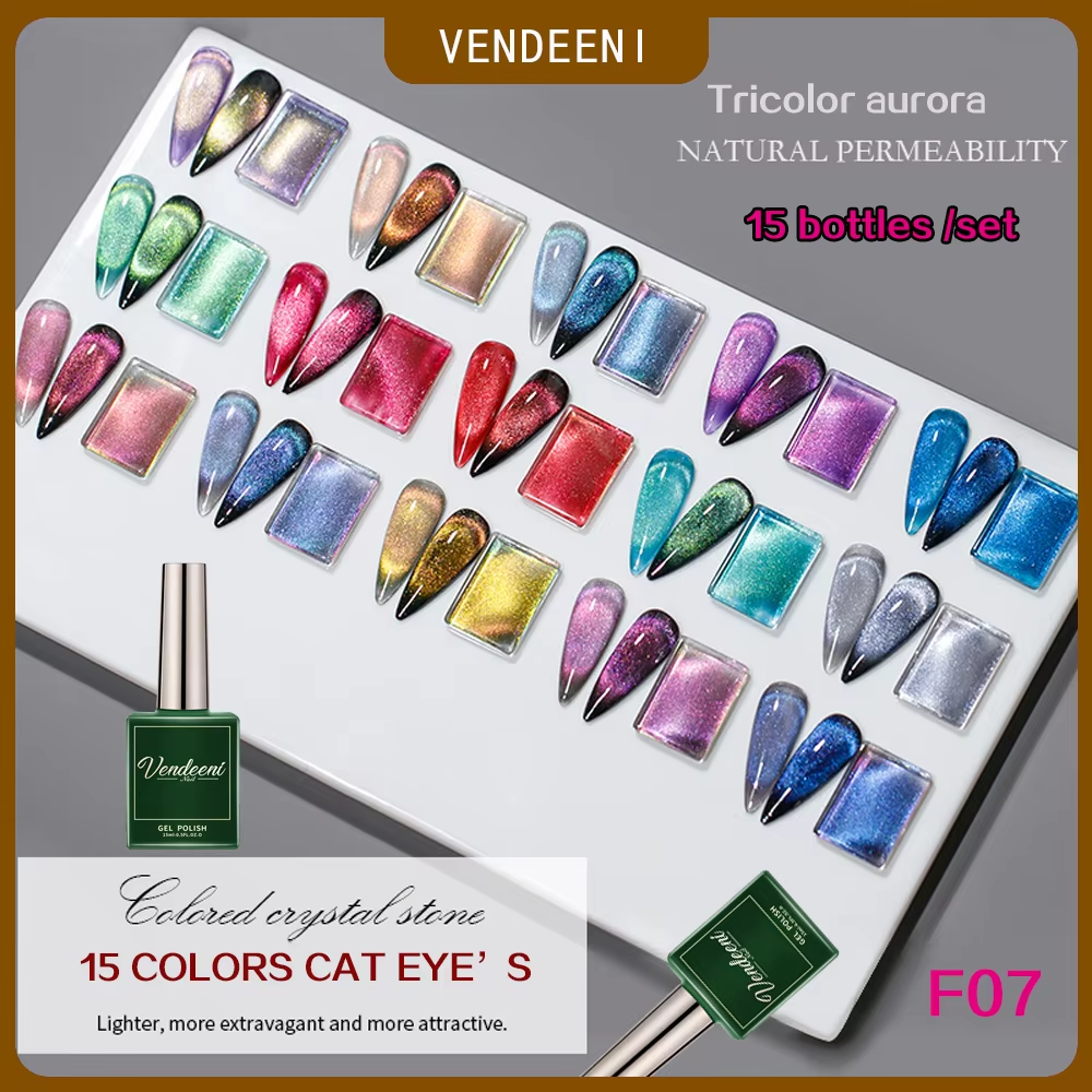 A display of 15 nail polish bottles, each with a different vibrant color, from the Vendeeni Tricolor Aurora collection.